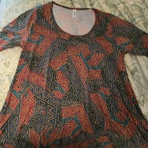LulaRoe short sleeved flowy top, size Medium, runs generously in sizing.